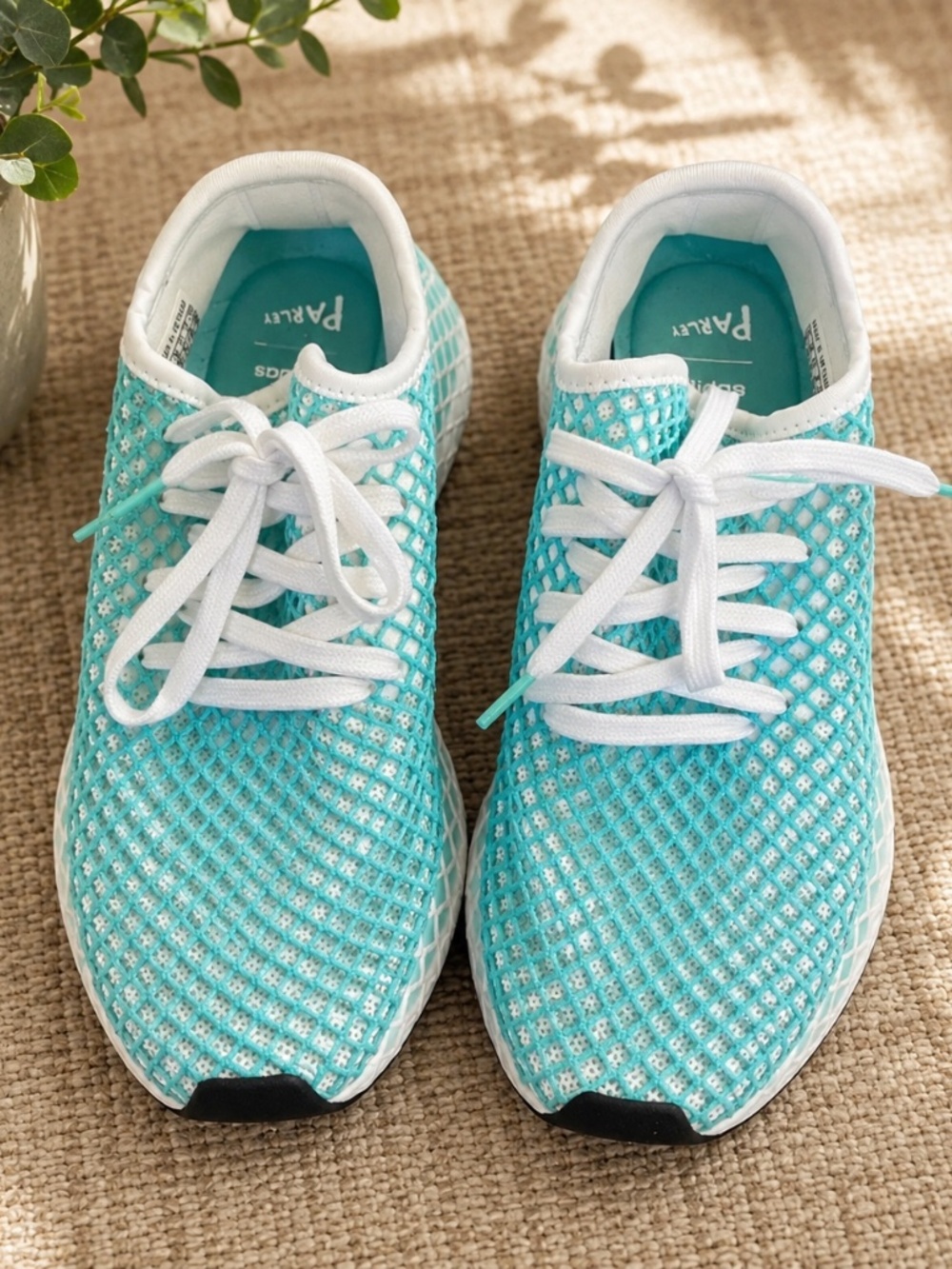 Adidas blue netted tennis shoes